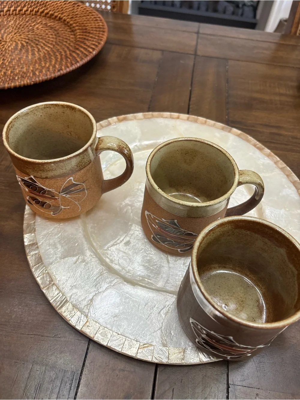 Three vintage stoneware pottery mugs with hand painted fish